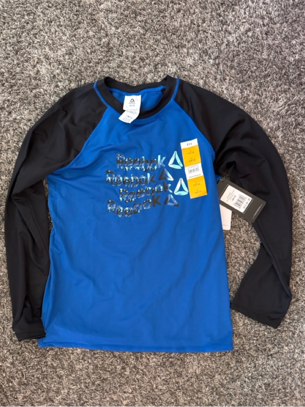 Reebok Royal Blue and Black Raglan Sleeve Performance Top or rash  size 10/12